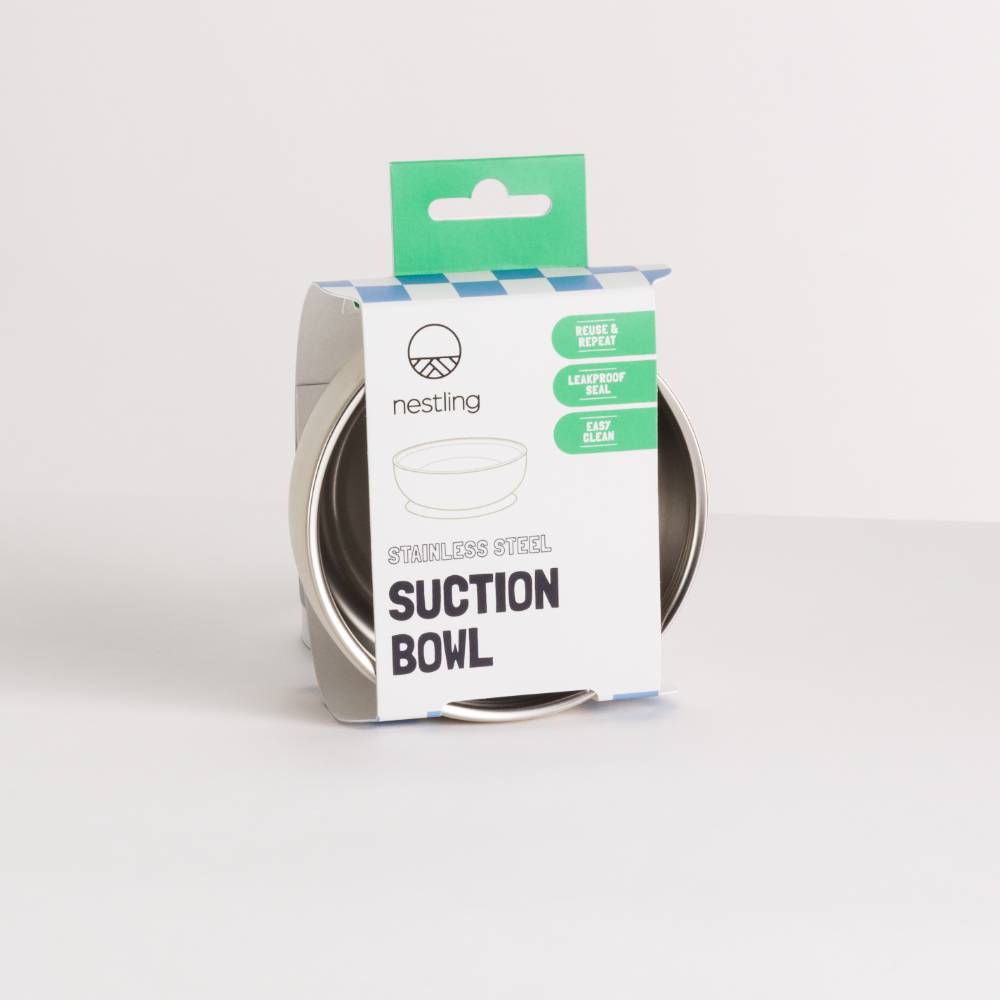 Nestling stainless steel suction bowl packaging with a white background