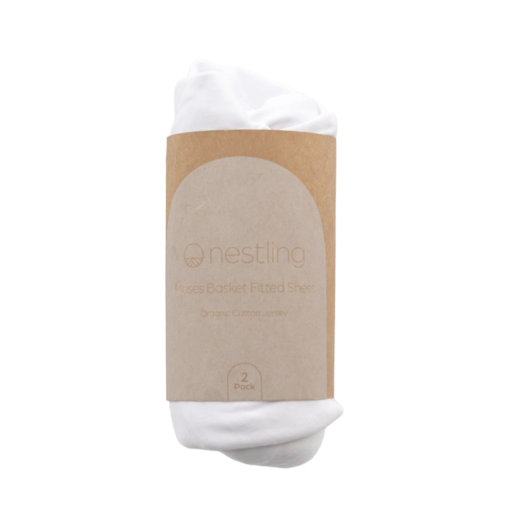 White moses basket sheet with brown packaging labeled 'nestling' on a white background
