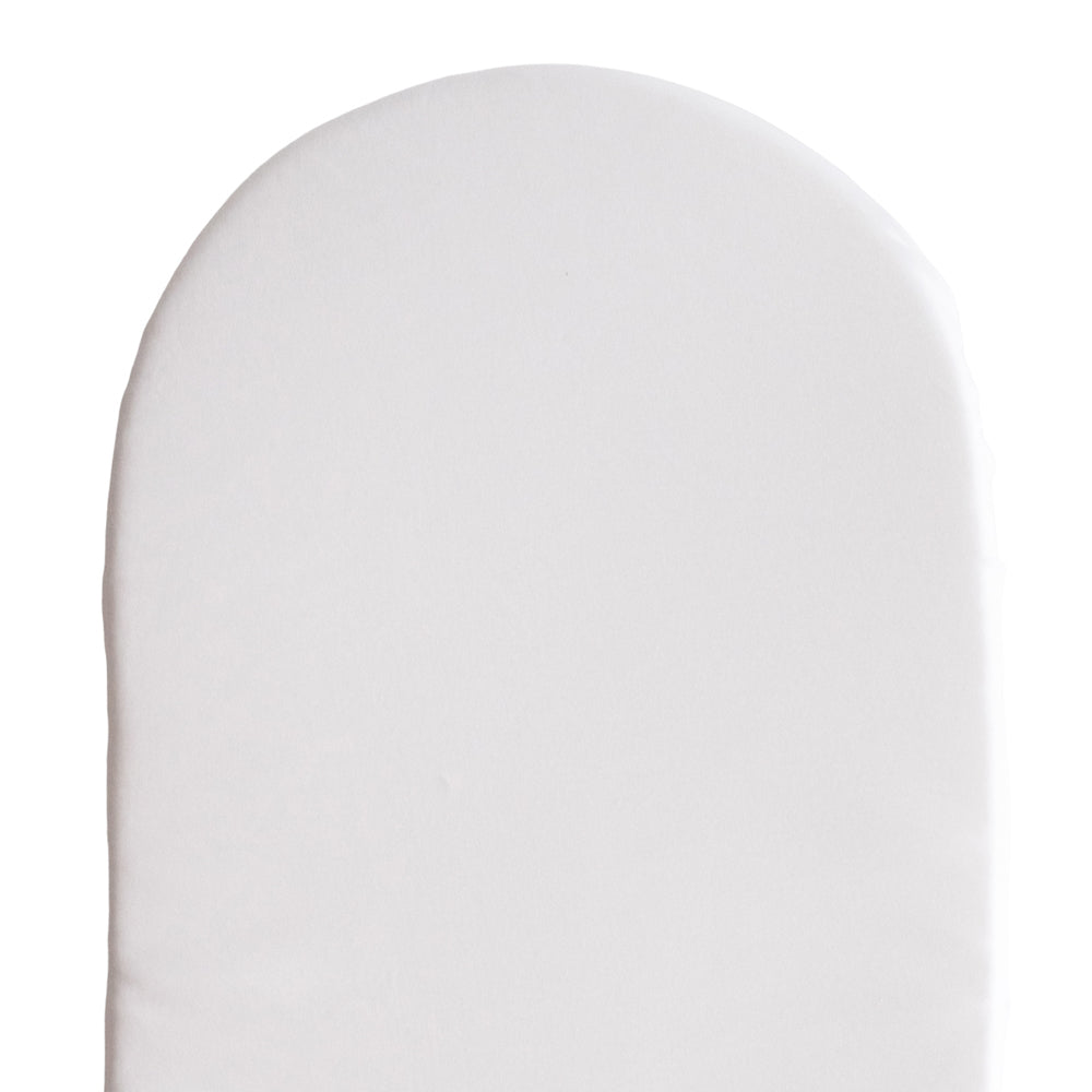White fitted sheet on a mattress on white background