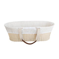 White print moses basket liner on a mattress on a white background