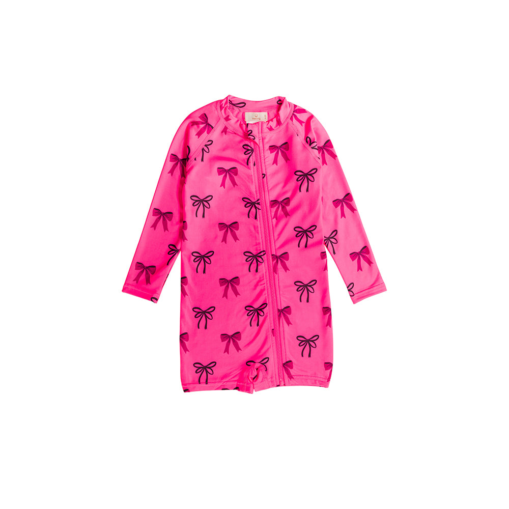 Short Boyleg Swimsuit in Neon Pink Bows pattern on a white background