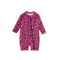 Pink long sleeve shortie swim onesie with leopard print on a white background