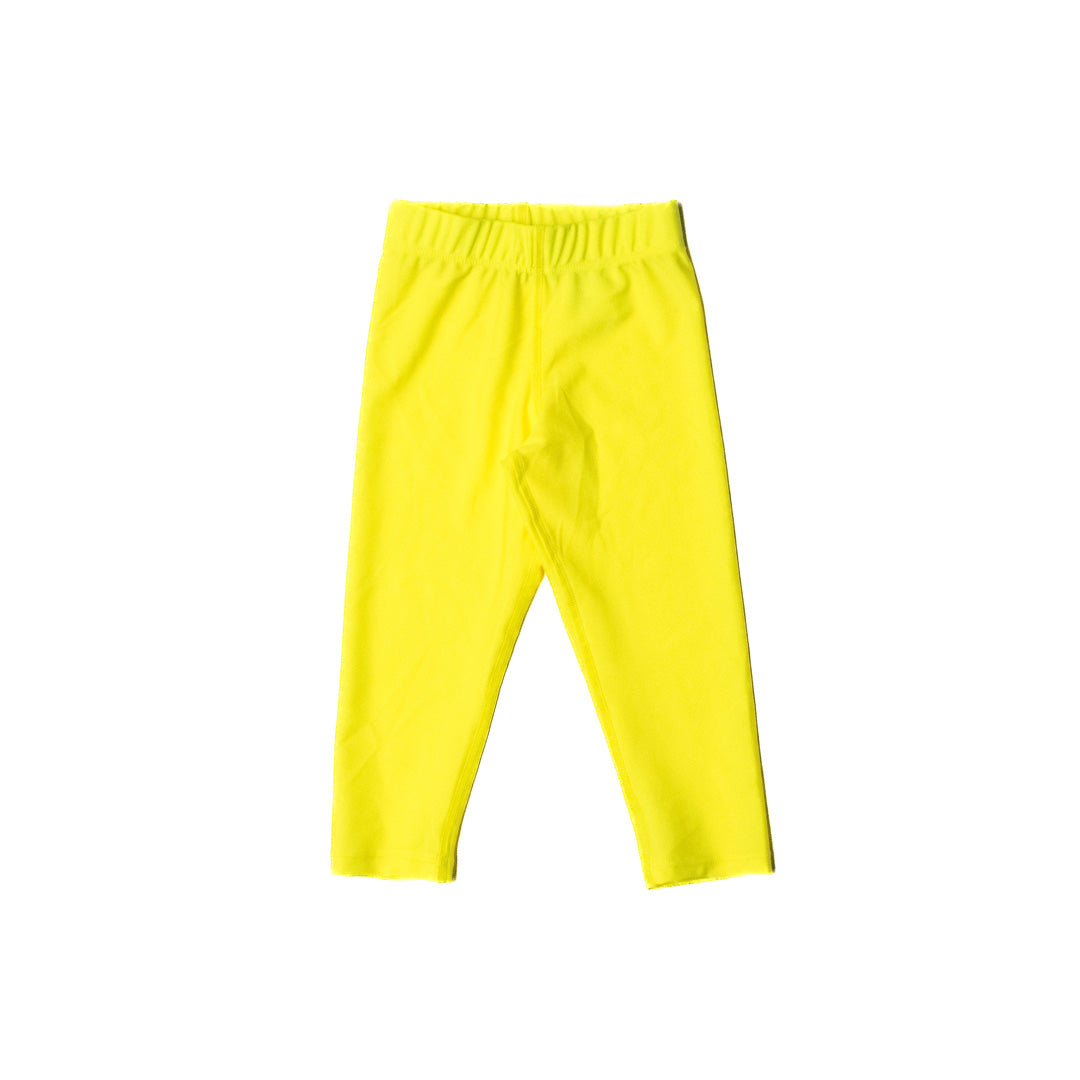 Neon yellow swim leggings on a white background