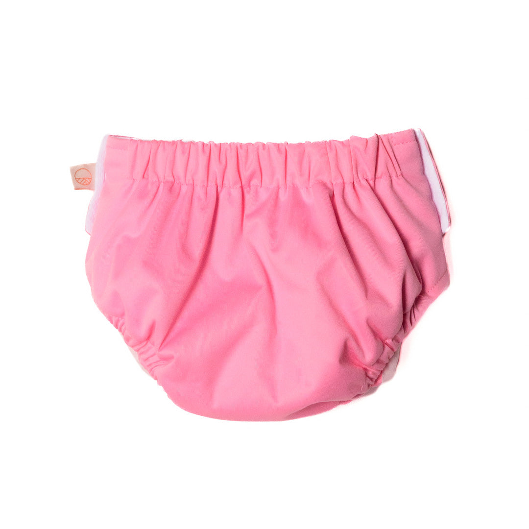 Pink reusable swim nappy on a white background