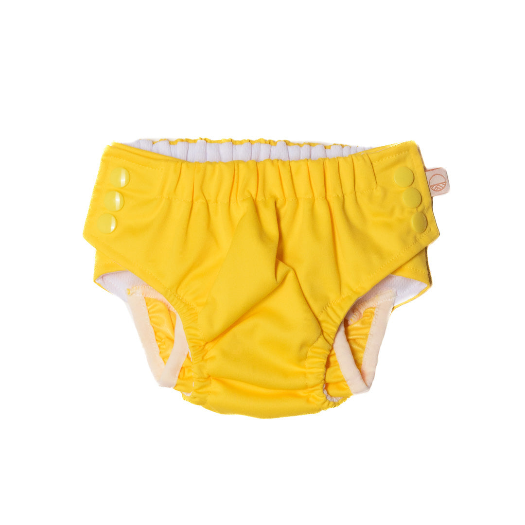 Yellow reusable swim nappy with white trim on a white background