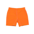 Neon orange swim shorts on a white background