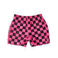 Checkered neon swim jammers with pink and black pattern on a white background