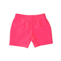 Bright neon pink swim shorts on a white background
