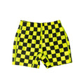 Checkered swim jammers with black and yellow pattern on a white background