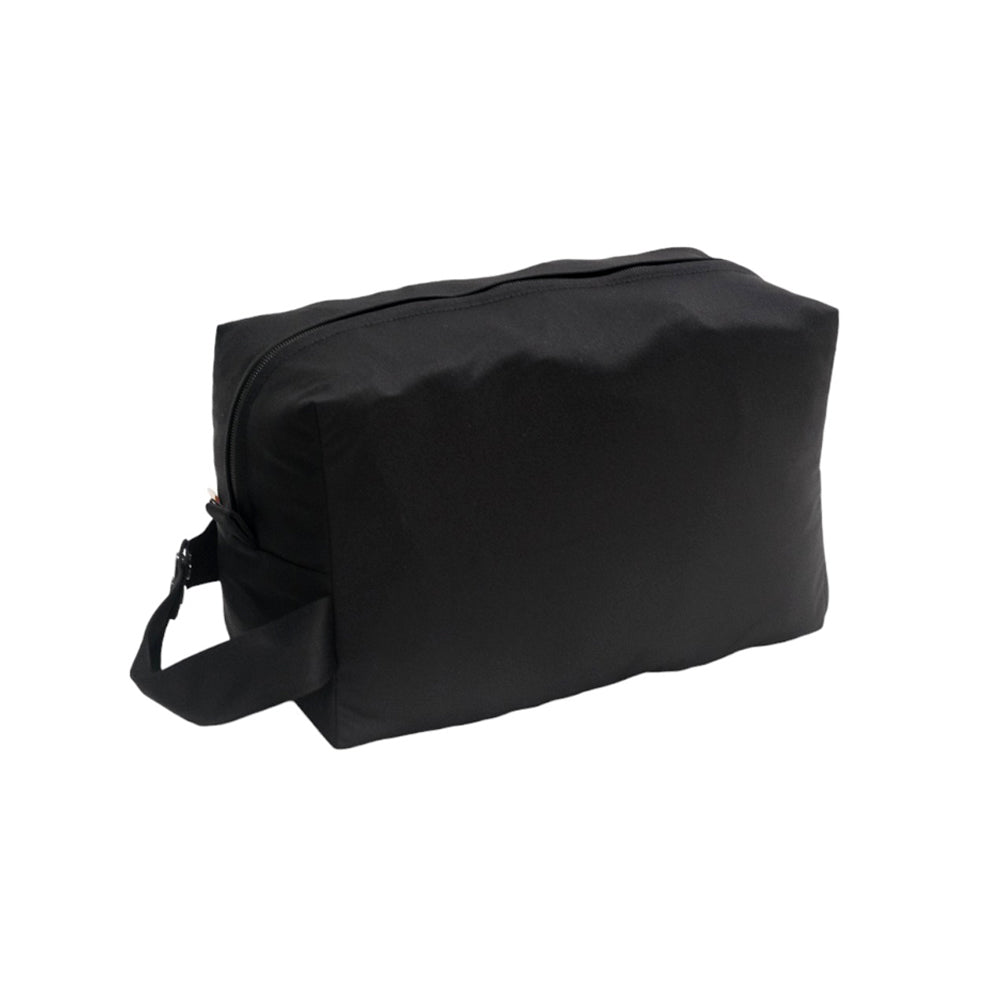 Black travel packing organiser on a white background