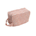 Floral-patterned travel organiser pod on a white background