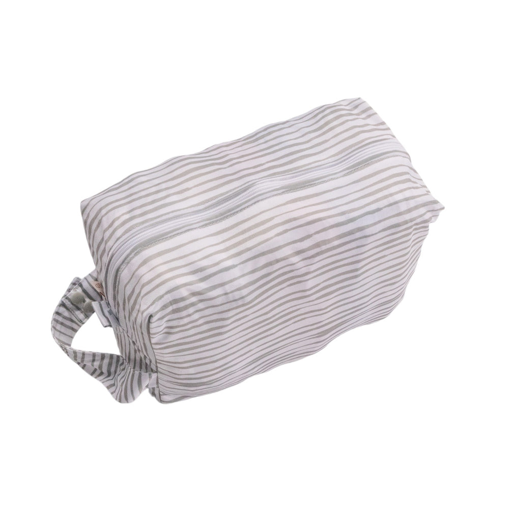 Striped travel packing pod on a white background