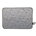 Rabbit patterned out & about change mat on a light gray background