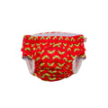 Red reusable swim nappy with a yellow banana pattern on a white background