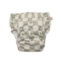 Baby nappy with green check pattern on a white background