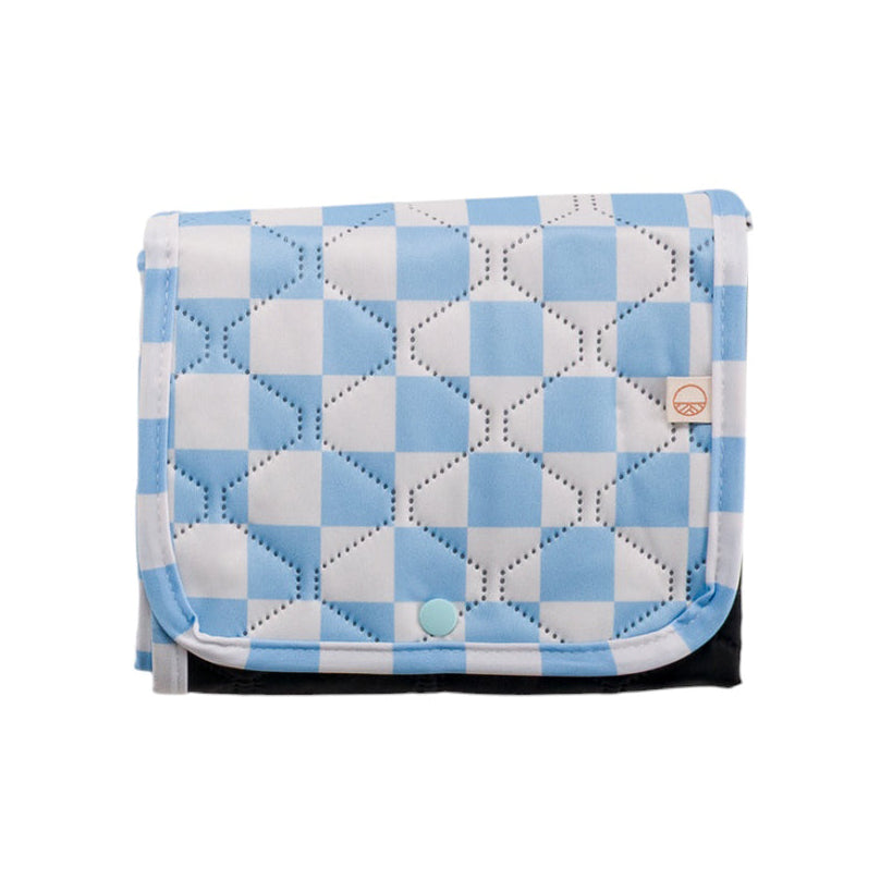 Blue and white checkered quilted baby change mat folded on a white background