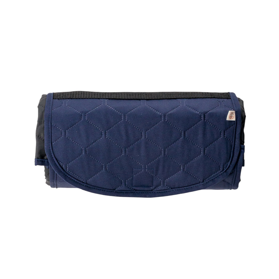 A navy blue quilted kids play mat with a diamond pattern, shown rolled up on a plain white background.