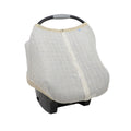 Cotton muslin beige and white gingham print baby car seat cover on a white background