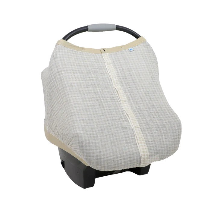 Cotton muslin beige and white gingham print baby car seat cover on a white background
