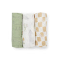 Three cotton muslin baby swaddle blankets with green line, white desert and beige checkered pattern on a white background