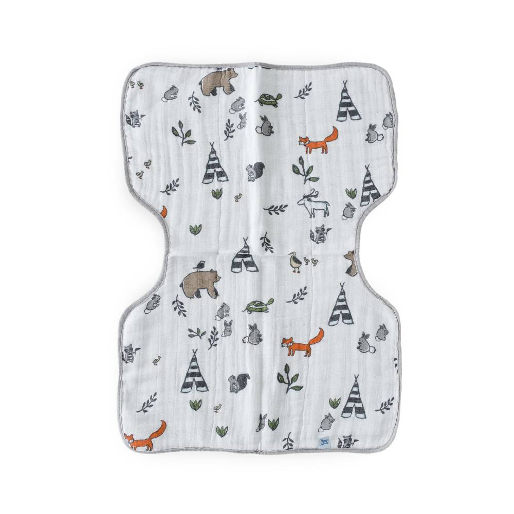 White cotton muslin burp cloth with forest animal pattern on a white background