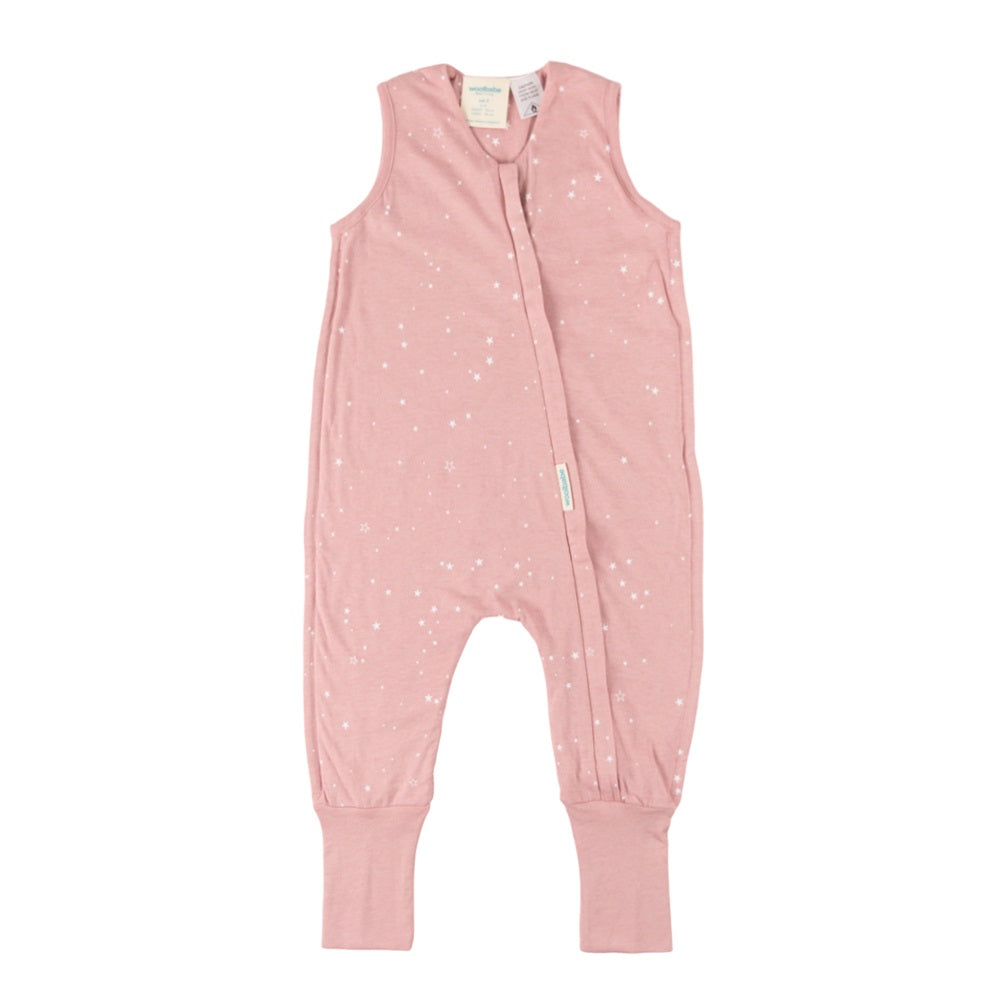 Pink baby onesie with white star pattern on a white background