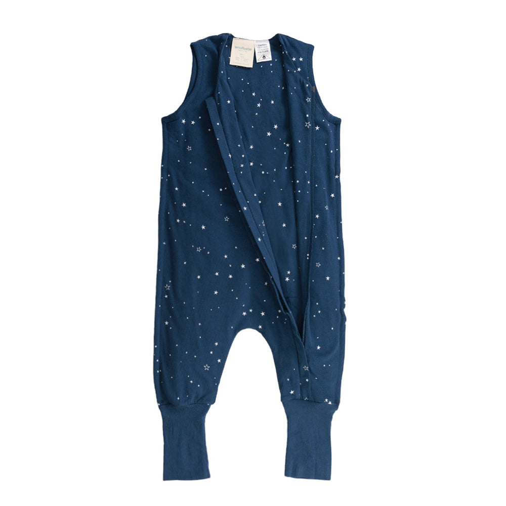 Navy blue baby sleeveless onesie with star pattern on a white background