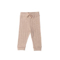 Beige woolbabe relaxed pant with drawstring on a white background