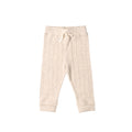Beige merino baby pants with a drawstring on a white background