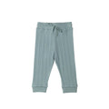 Light blue ribbed woolbabe drawstring baby pants on a white background