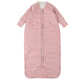 Pink sleeved baby sleeping bag with white star pattern on a white background