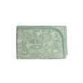 Green baby merino cotton swaddling blanket with white floral pattern on a white background