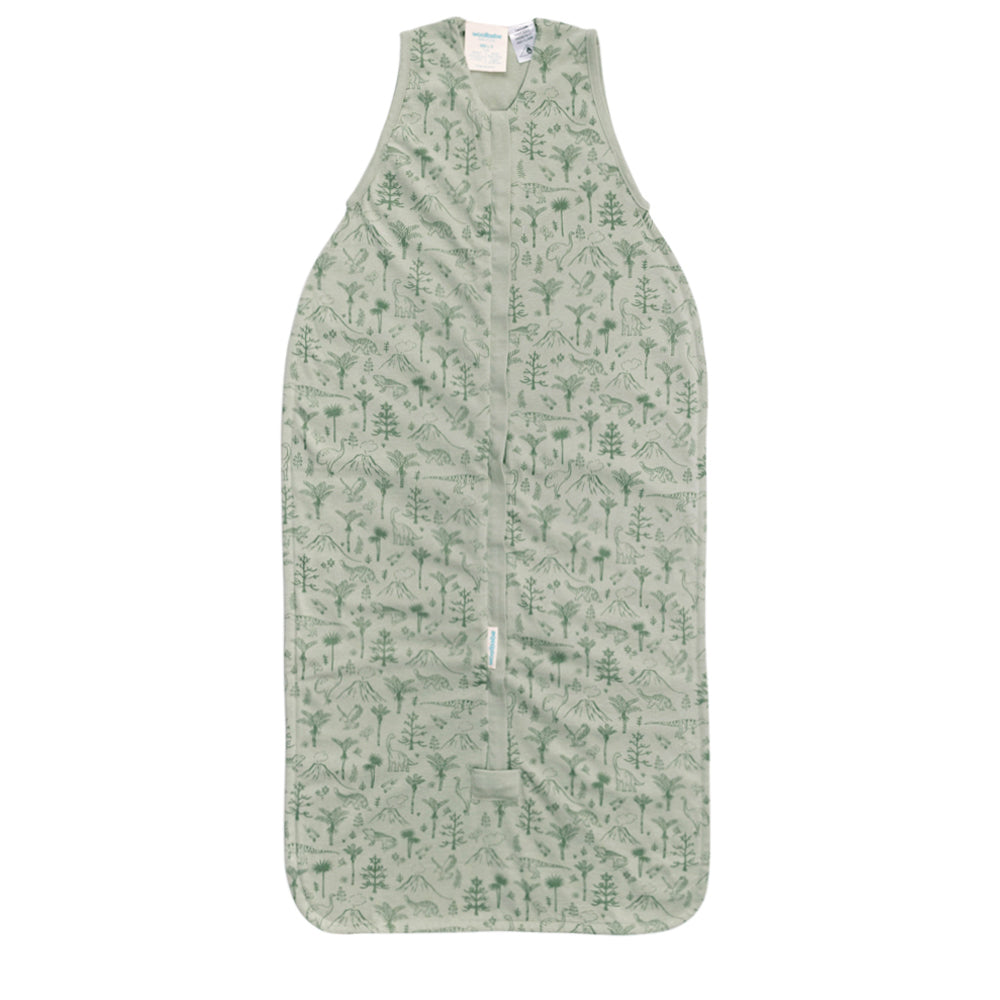 Green baby sleeping bag with dinosaur and nature-themed pattern on a white background
