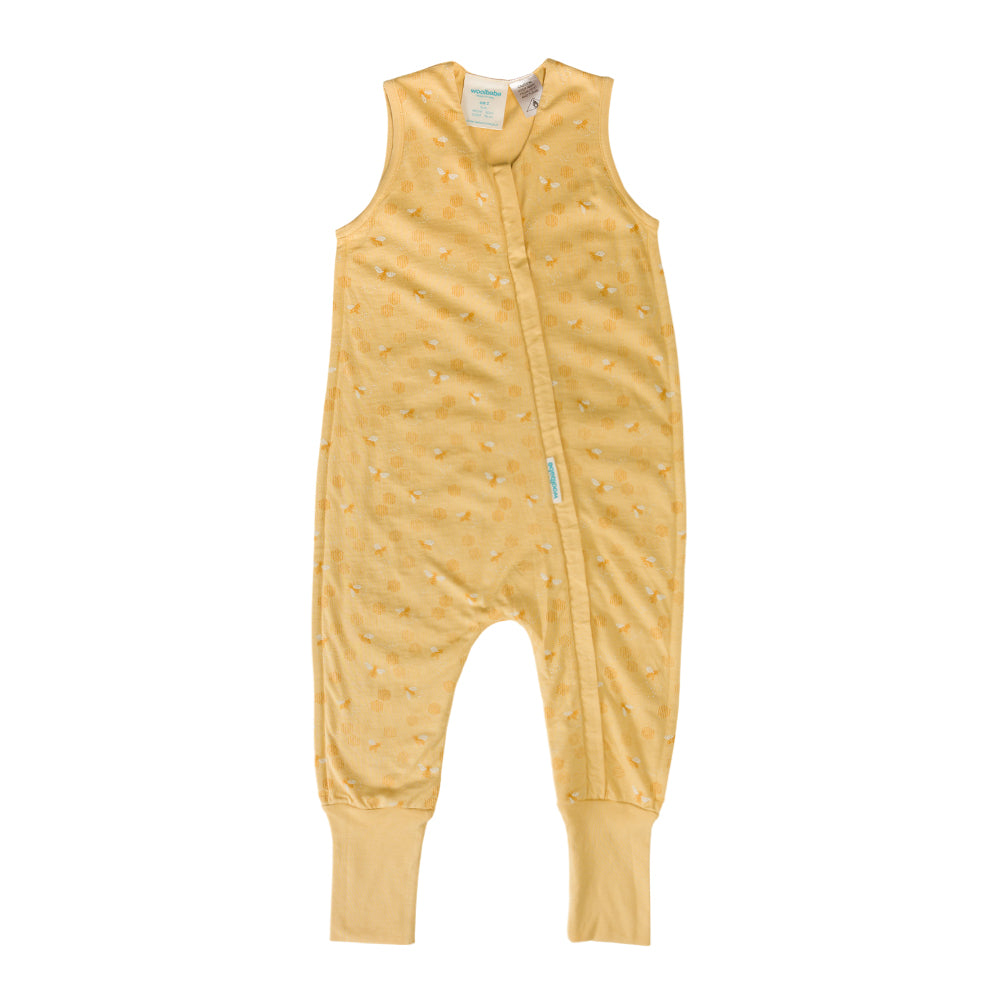 Yellow baby onesie with a zipper on a white background