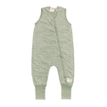 Green baby romper with Maori wave pattern on a white background