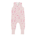 Pink children's onesie with mermaid pattern on a white background
