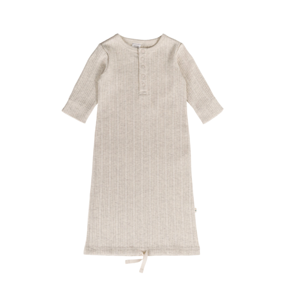 cream mark baby gown made from merino with long sleeves on a white background