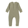 Green ribbed baby onesie on a white background