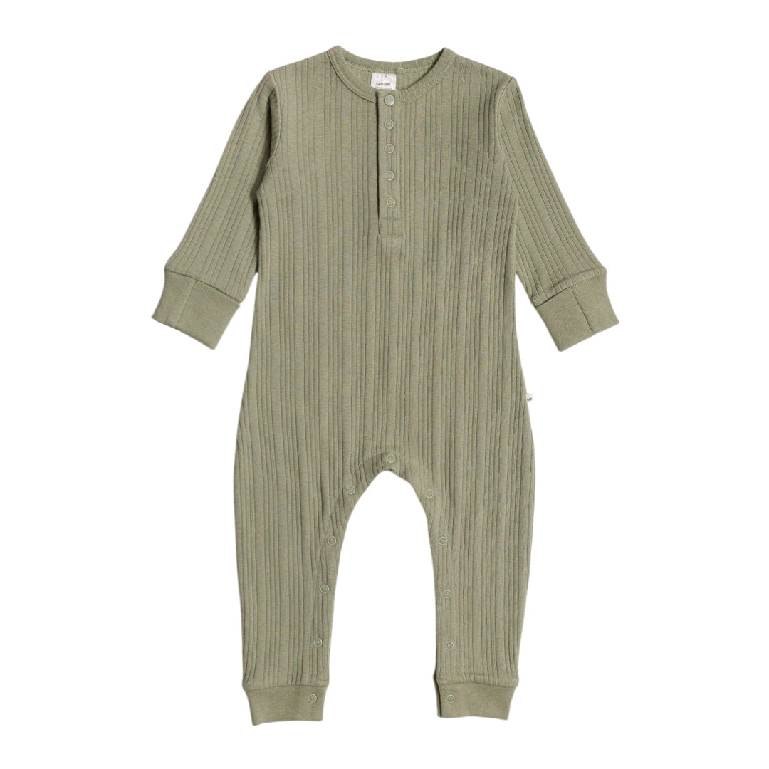 Green ribbed baby onesie on a white background