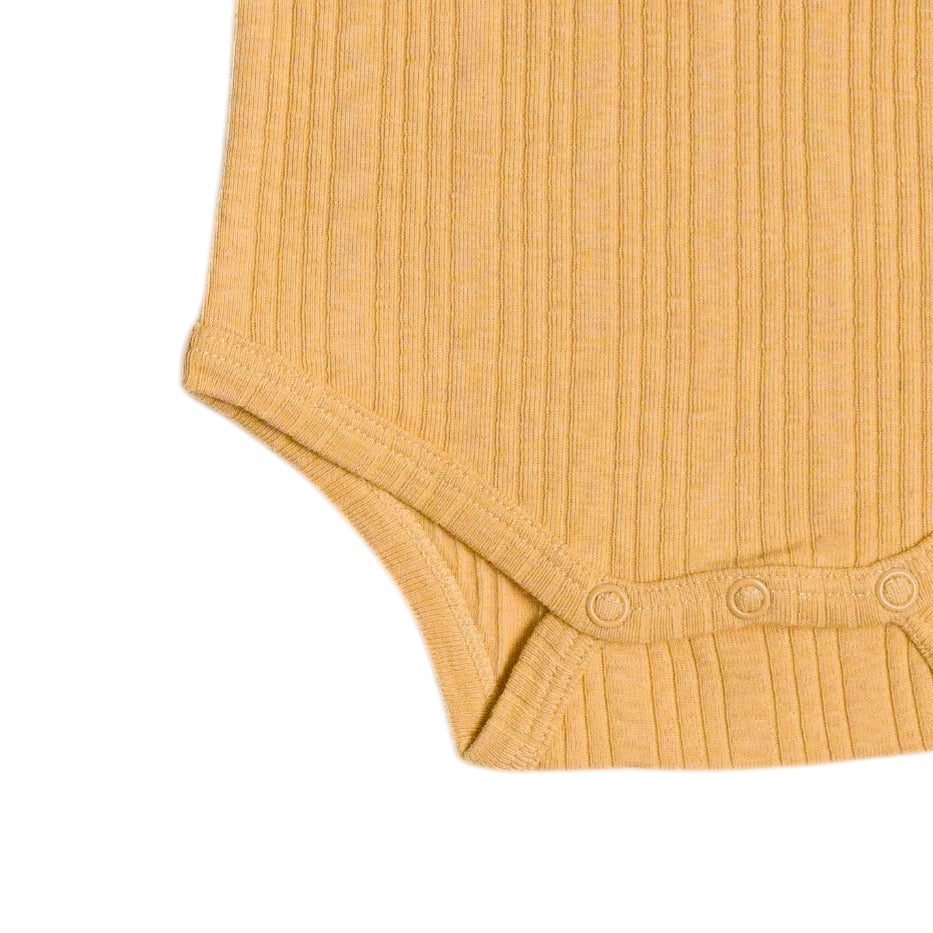 Close-up of a mustard yellow ribbed baby bodysuit on a white background
