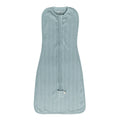 Light blue woolbabe zip swaddle  on a white background