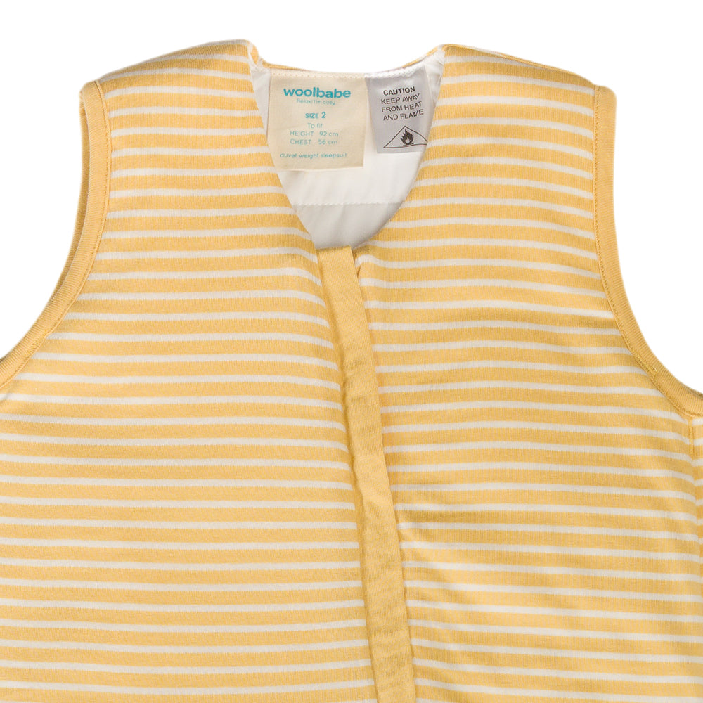 Yellow striped sleep onesie with a visible brand label on a white background