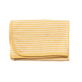 Yellow and white striped blanket on a white background