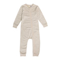 woolbabe onesie with maori wave design on white background