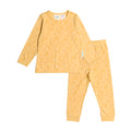 Yellow children's pajama set with small bee patterns on a white background