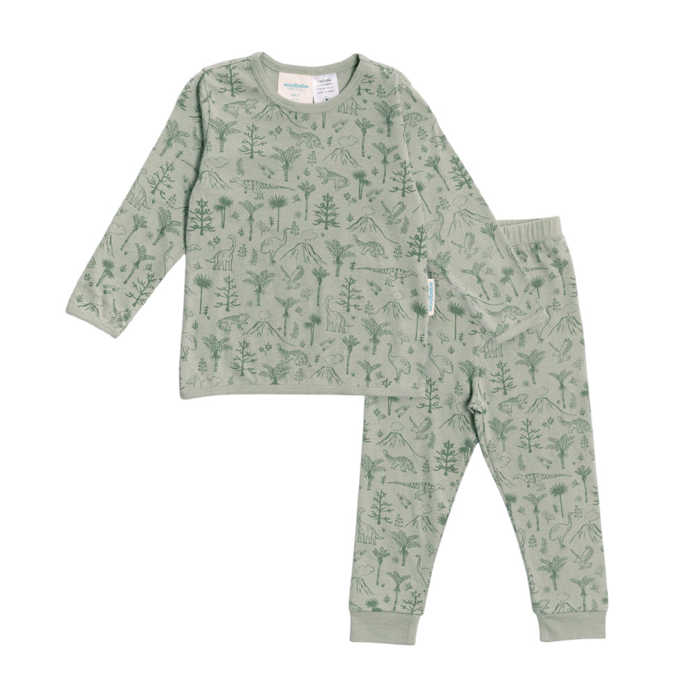 Children's pajama set with dinosaur nature-themed pattern on a white background