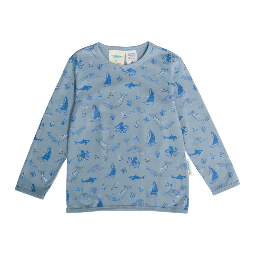 Children's long-sleeve shirt with blue sea-themed pattern on a white background