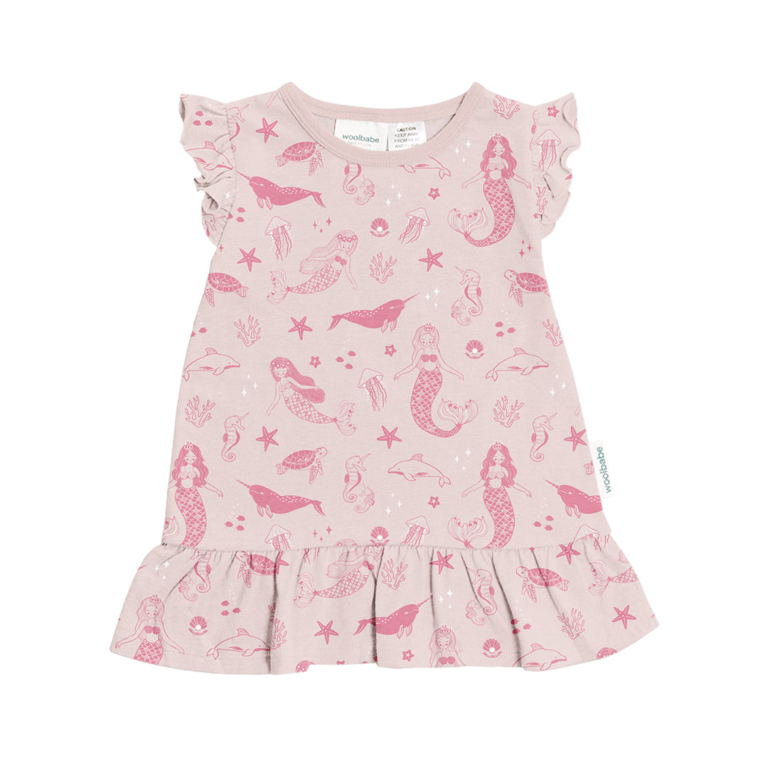 Pink children's nightie with mermaid and whale pattern on a white background