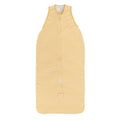 Yellow and white striped baby sleeping bag on a white background