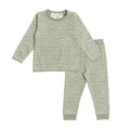 Children's Bo + Ko woolbabe pajama set with Maori wave pattern on a white background
